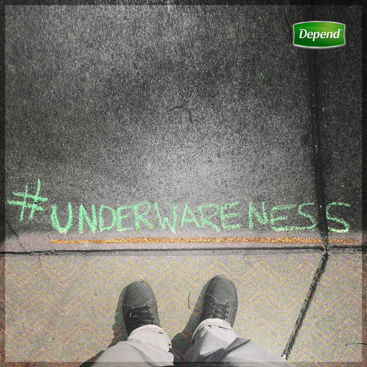 Underwareness campaign hashtag written in chalk on sidewalk