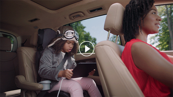 Animated email masthead showing family seated inside Cadillac XT6 highlighting rear-seat comfort.