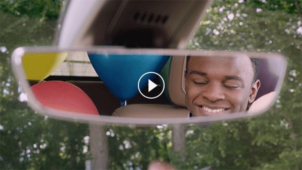 Animated email masthead demonstrating Cadillac XT6 rear camera mirror feature.